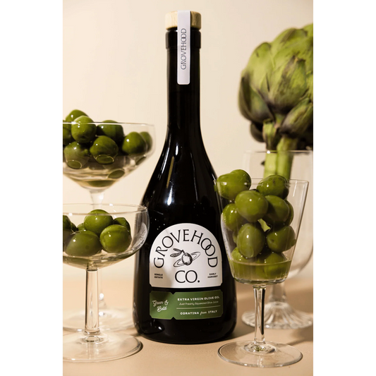 Grovehood Collective Italian extra virgin olive oil bottle with green olives